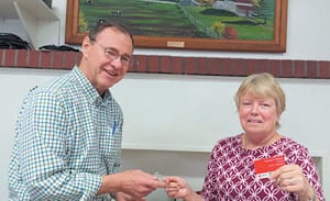 Mike Nyquist (left), coordinator of Mountaintop Blood Drive, presents a one-gallon pin to Jennifer G McEvoy.